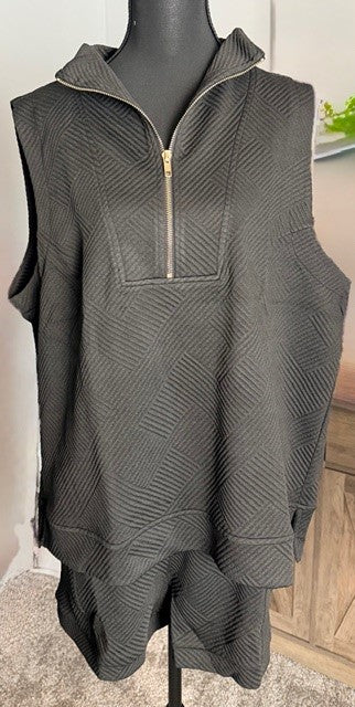 Gray sleeveless hoodie with a zipper on a mannequin against a neutral background
