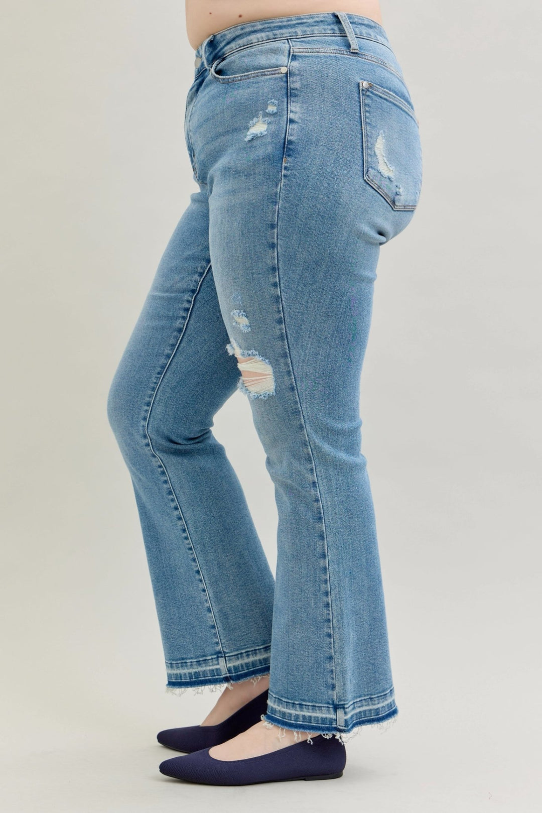 Judy Blue Jeans (NP) - Mid Rise Distressed Release Hem Boot Cut | Nikki &amp; Co. Boutique