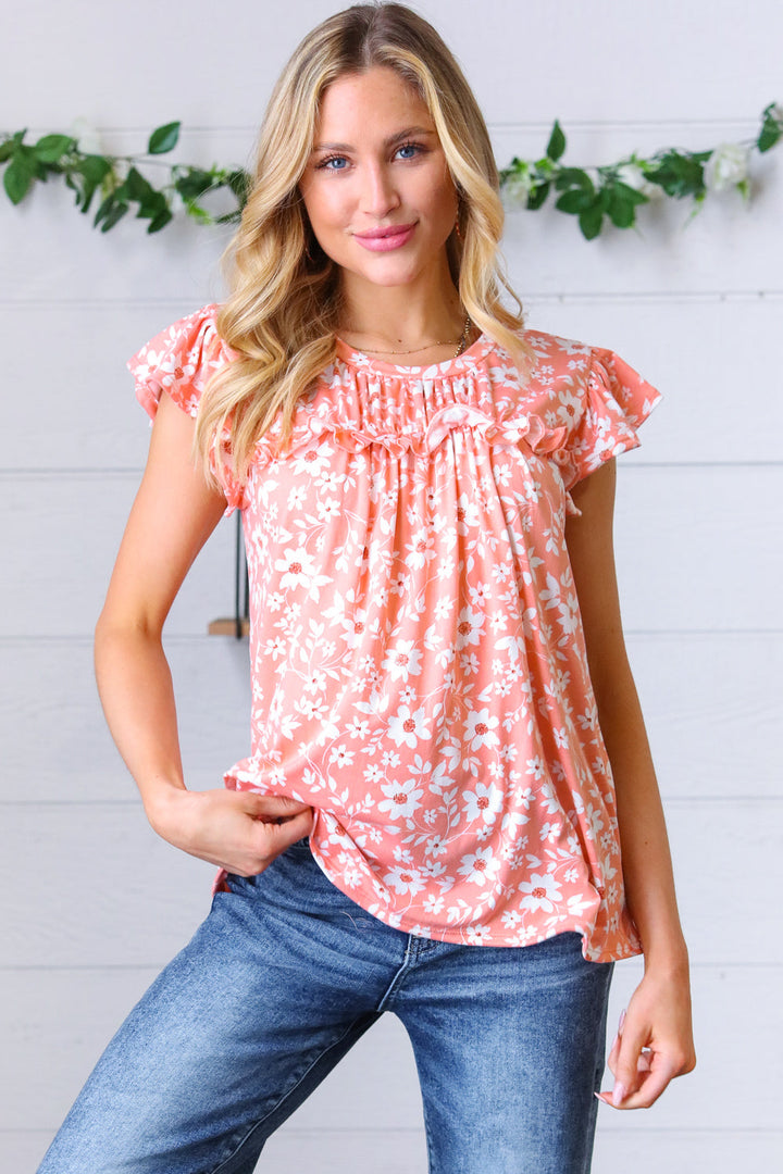 Peach Floral Print Frilled Shorts Sleeve Yoke Tops | Nikki &amp; Co. Boutique
