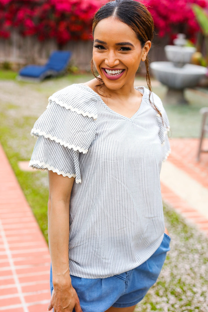 Lovely In Gray Stripe Tiered Ruffle Sleeve Ric Rac Trim Tops | Nikki &amp; Co. Boutique