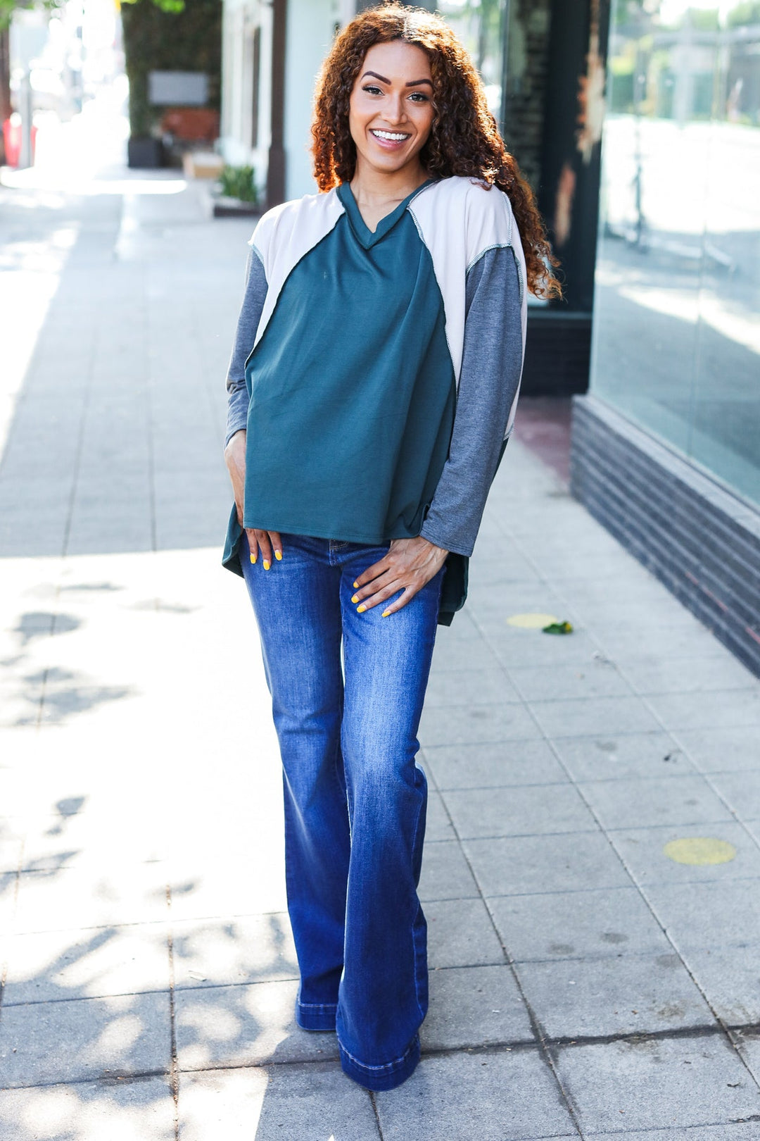 Stand Out Hunter Green V Neck Raglan Color Block Outseam Top | Nikki &amp; Co. Boutique