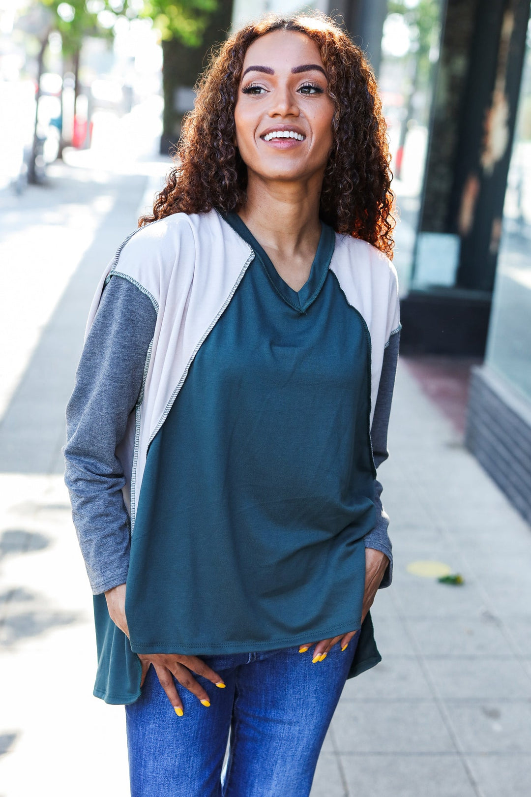 Stand Out Hunter Green V Neck Raglan Color Block Outseam Top | Nikki &amp; Co. Boutique