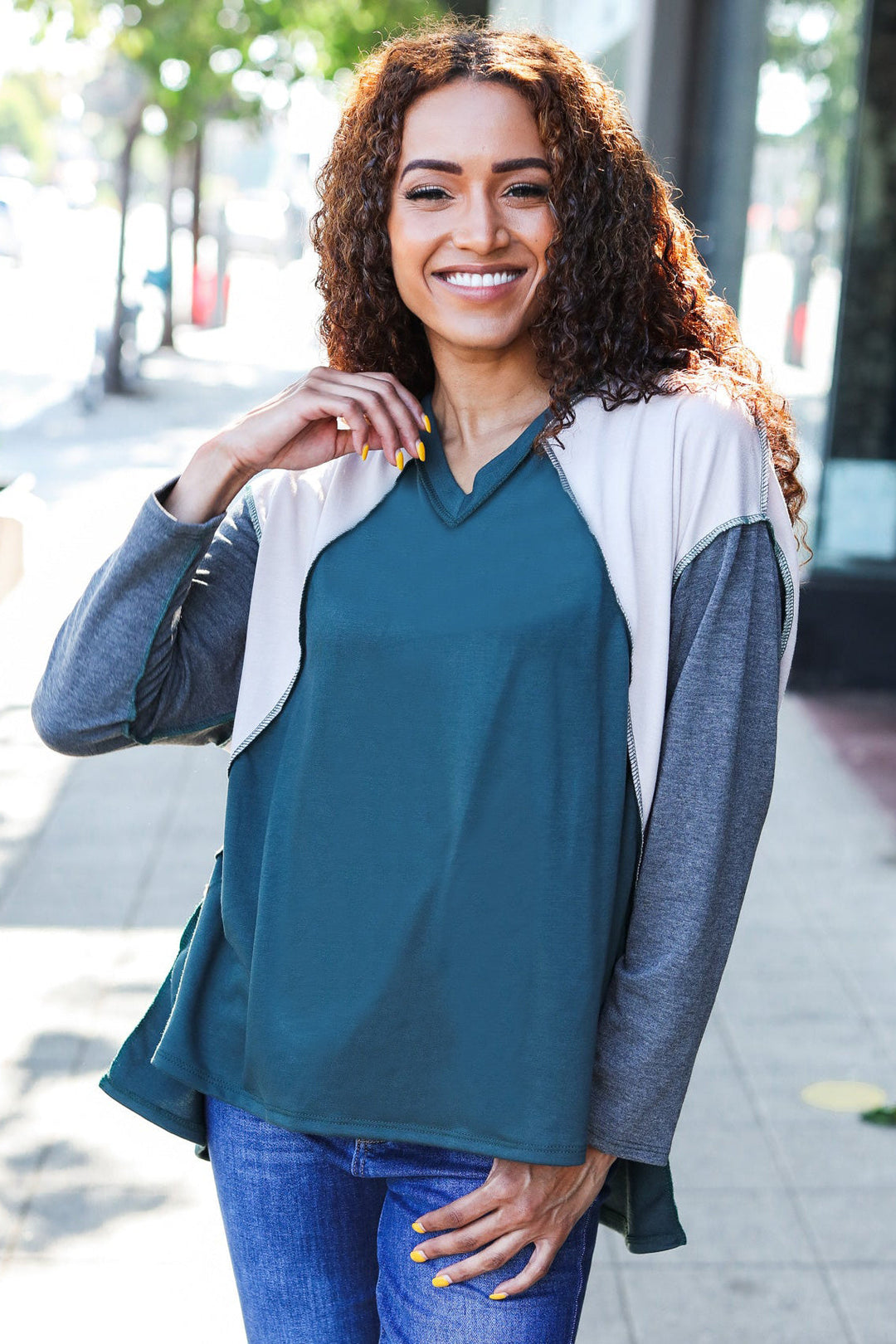 Stand Out Hunter Green V Neck Raglan Color Block Outseam Top | Nikki &amp; Co. Boutique
