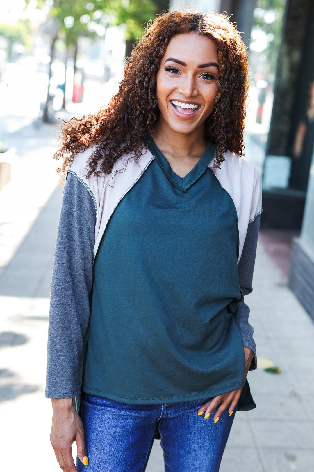 Stand Out Hunter Green V Neck Raglan Color Block Outseam Top | Nikki &amp; Co. Boutique