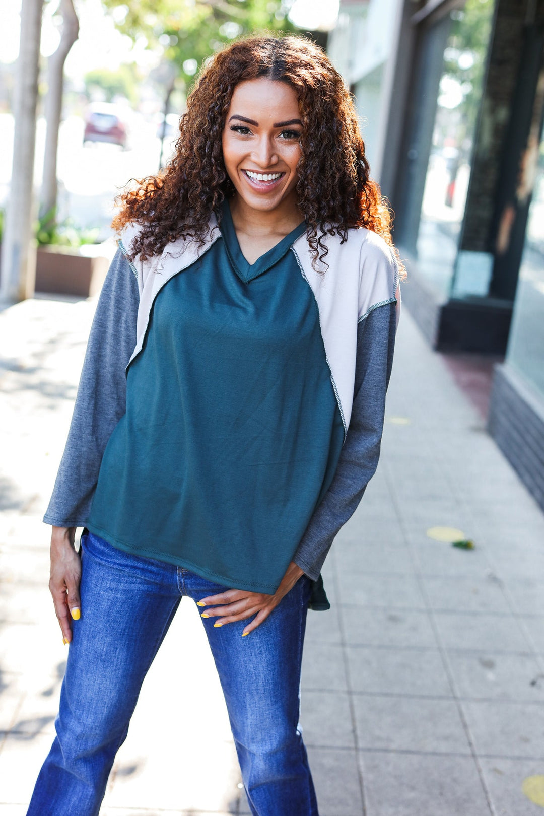 Stand Out Hunter Green V Neck Raglan Color Block Outseam Top | Nikki &amp; Co. Boutique