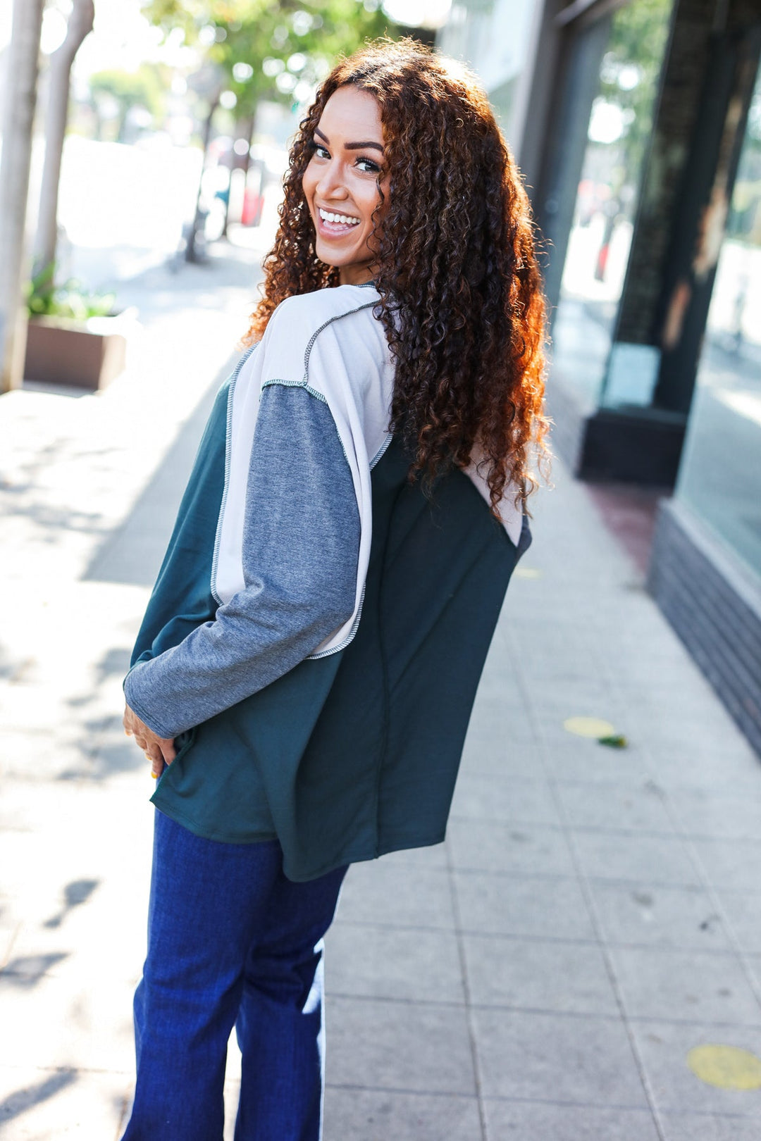 Stand Out Hunter Green V Neck Raglan Color Block Outseam Top | Nikki &amp; Co. Boutique