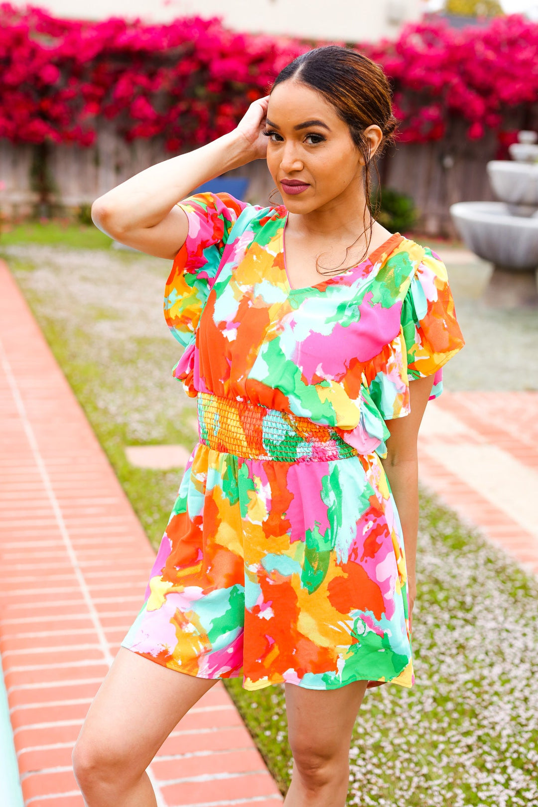 Under The Sun Abstract Floral Smocked Waist V Neck Flutter Sleeve Romper | Nikki &amp; Co. Boutique