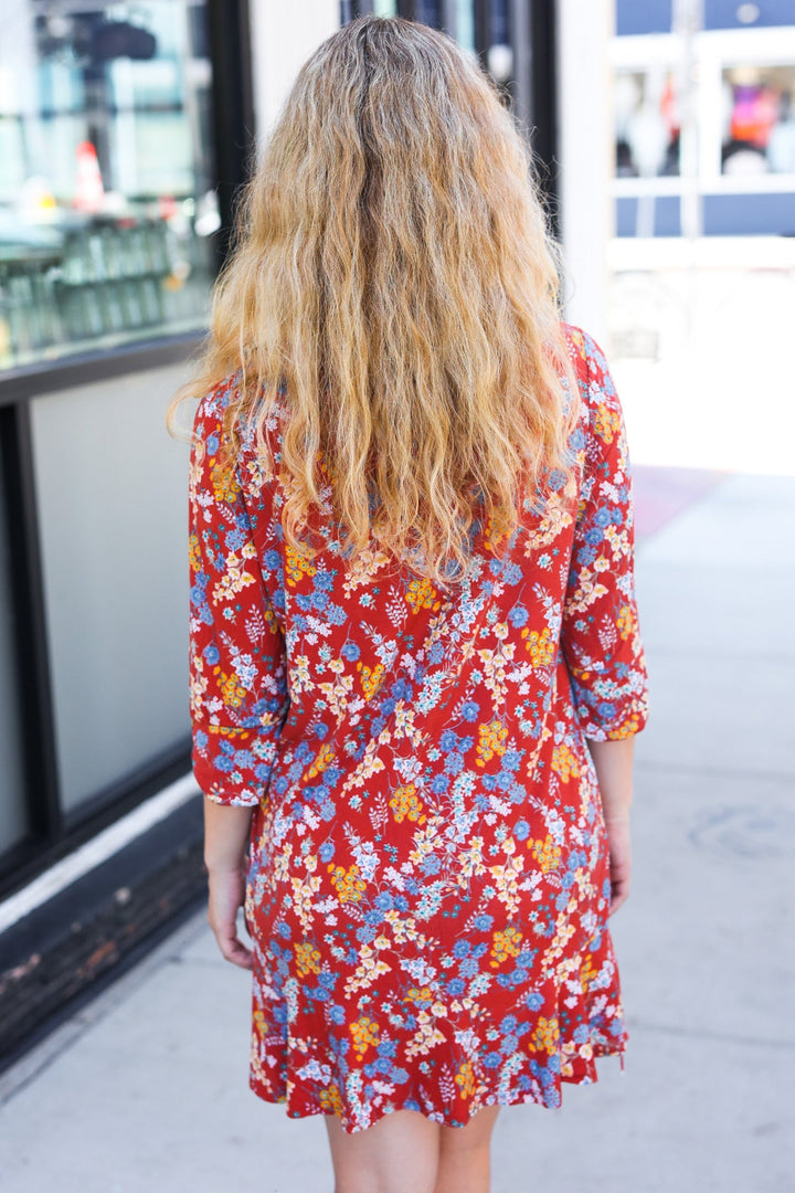 Spread Joy Rust Ruffle Floral Hem 3/4 Slit Sleeve Dress | Nikki &amp; Co. Boutique