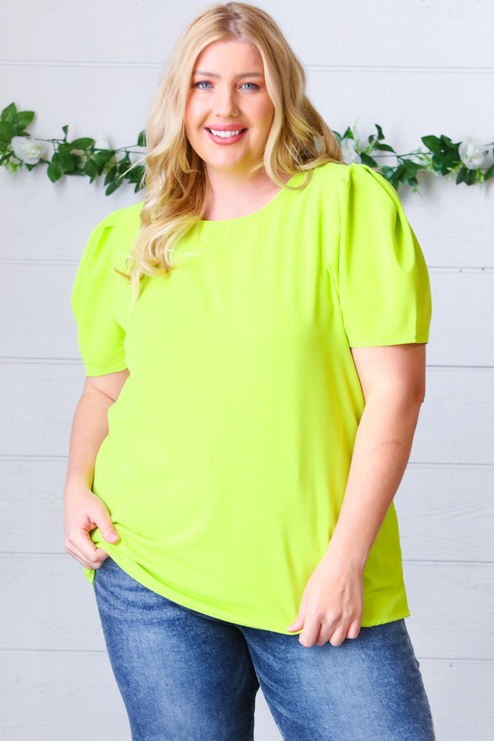 Neon Green Round Neck Puff Sleeve Crepe Tops | Nikki &amp; Co. Boutique