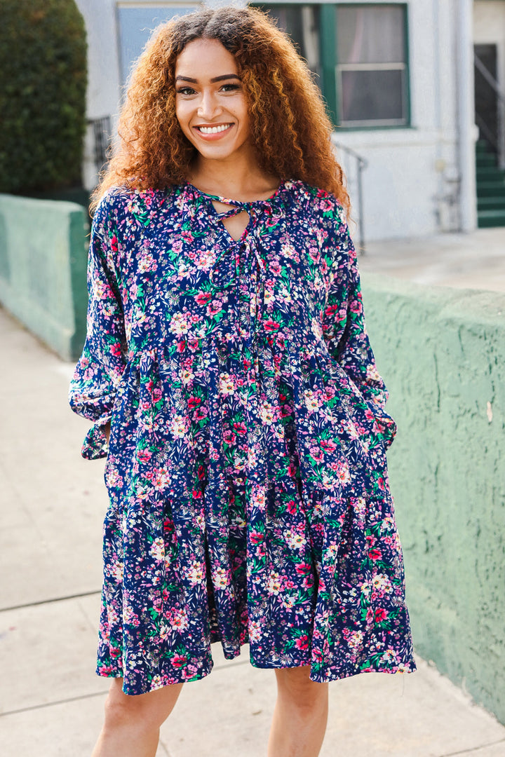 Feeling Joyful Navy Floral Bow Tie Babydoll Long Ruffle Sleeve Dress | Nikki &amp; Co. Boutique