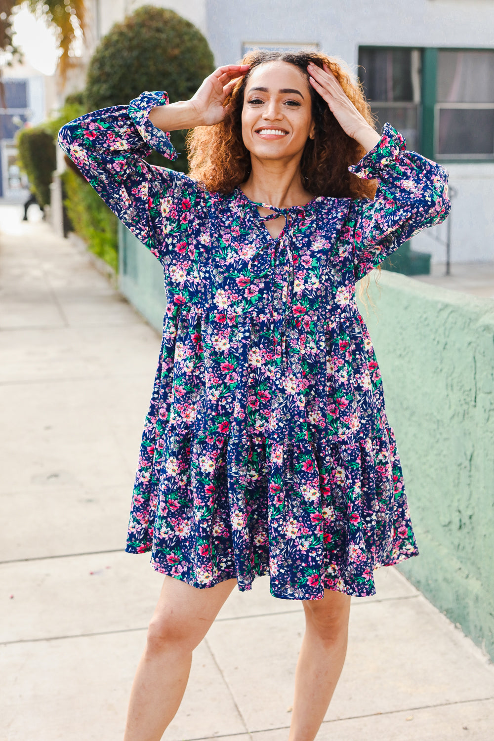 Feeling Joyful Navy Floral Bow Tie Babydoll Long Ruffle Sleeve Dress | Nikki &amp; Co. Boutique