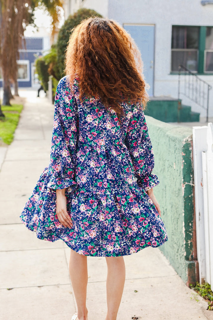Feeling Joyful Navy Floral Bow Tie Babydoll Long Ruffle Sleeve Dress | Nikki &amp; Co. Boutique