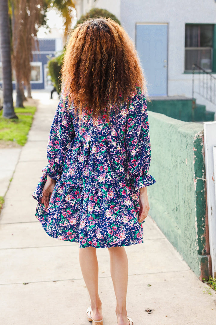 Feeling Joyful Navy Floral Bow Tie Babydoll Long Ruffle Sleeve Dress | Nikki &amp; Co. Boutique