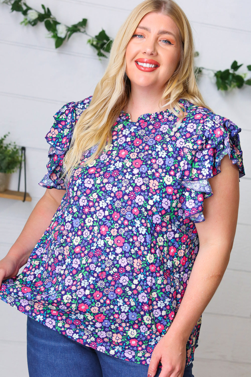Navy Floral Mock Neck Flutter Sleeve Tops | Nikki &amp; Co. Boutique