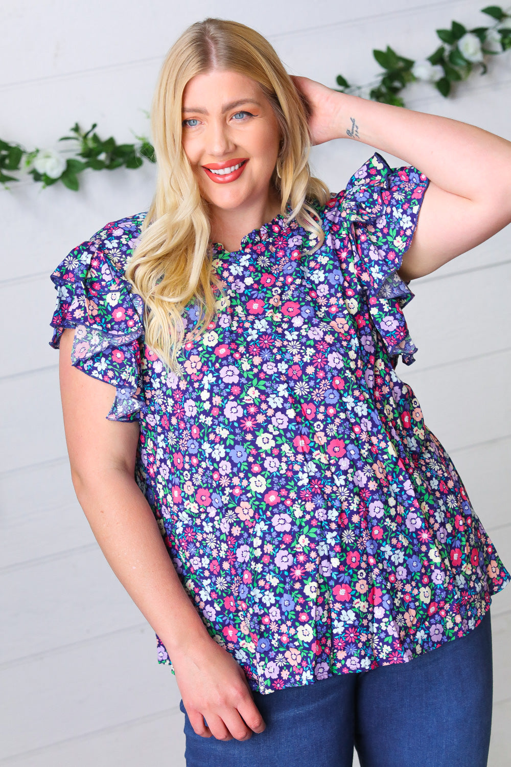 Navy Floral Mock Neck Flutter Sleeve Tops | Nikki &amp; Co. Boutique