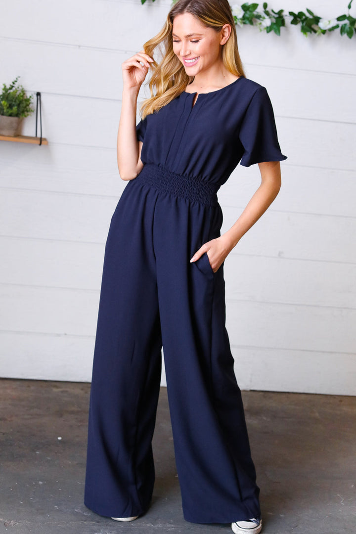 Dark Blue Smocked Waist Notch Neck Crepe Jumpsuit | Nikki &amp; Co. Boutique