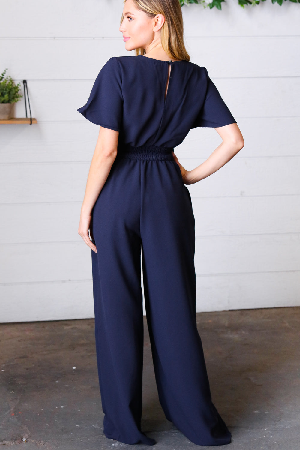 Dark Blue Smocked Waist Notch Neck Crepe Jumpsuit | Nikki &amp; Co. Boutique