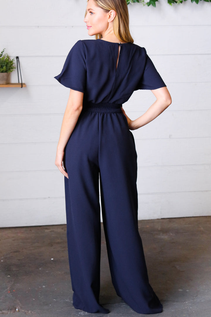 Dark Blue Smocked Waist Notch Neck Crepe Jumpsuit | Nikki &amp; Co. Boutique