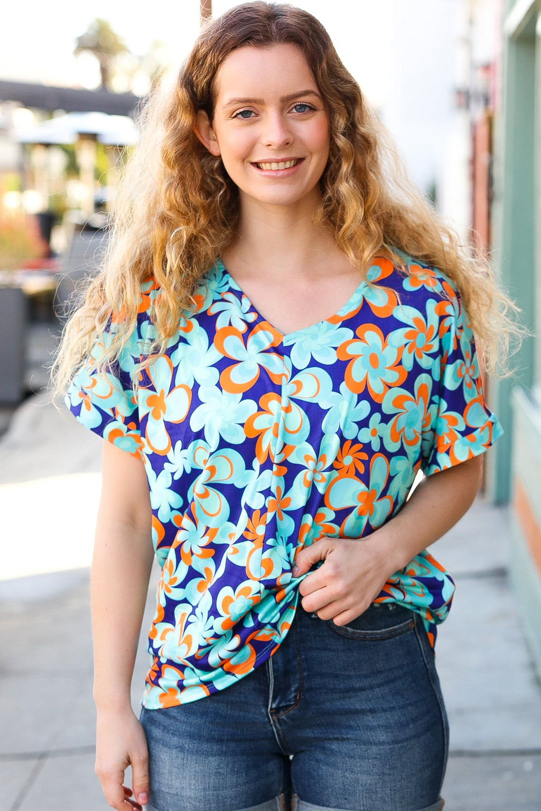 Blue &amp; Orange Flat Floral V Neck Tops | Nikki &amp; Co. Boutique