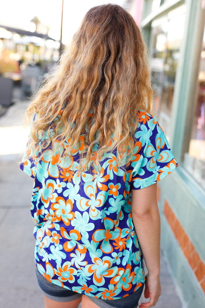 Blue &amp; Orange Flat Floral V Neck Tops | Nikki &amp; Co. Boutique