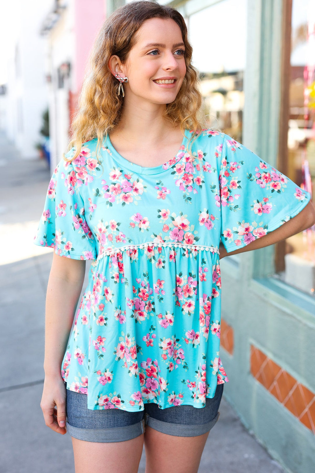 Sky Blue Three-Quarter Sleeve Floral Peplum Babydoll Top | Nikki &amp; Co. Boutique