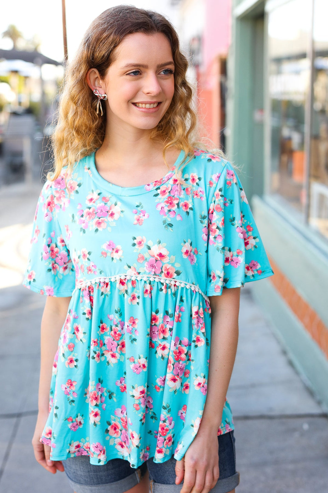 Sky Blue Three-Quarter Sleeve Floral Peplum Babydoll Top | Nikki &amp; Co. Boutique