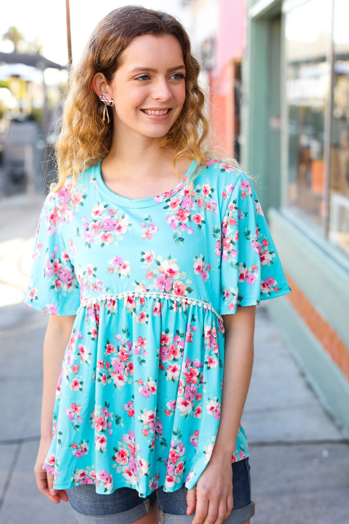 Sky Blue Three-Quarter Sleeve Floral Peplum Babydoll Top | Nikki &amp; Co. Boutique
