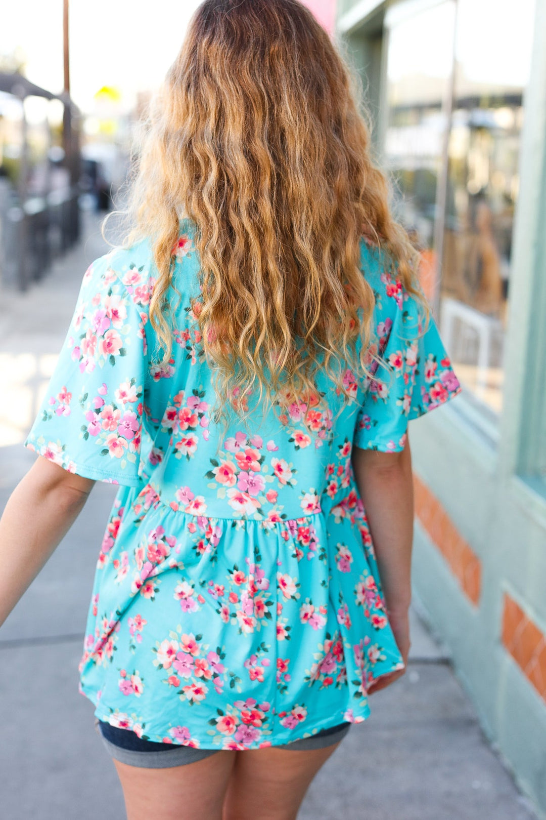 Sky Blue Three-Quarter Sleeve Floral Peplum Babydoll Top | Nikki &amp; Co. Boutique