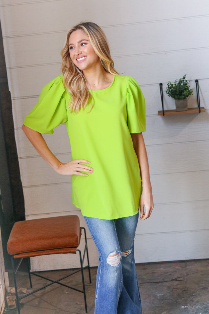 Neon Green Round Neck Puff Sleeve Crepe Tops | Nikki &amp; Co. Boutique