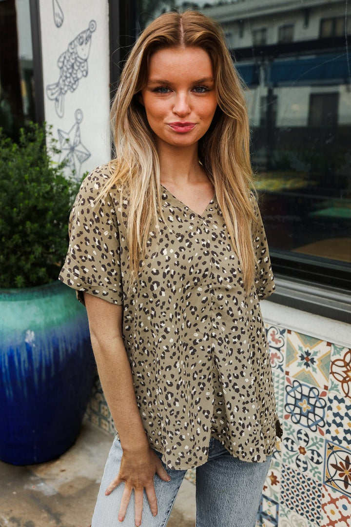 Best In Bold Sage Animal Print V Neck Dolman Side Slit Tops - Nikki &amp; Co. Boutique