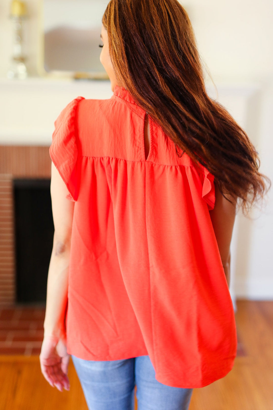 Red-Orange Mock Neck Flutter Sleeve Tops | Nikki &amp; Co. Boutique