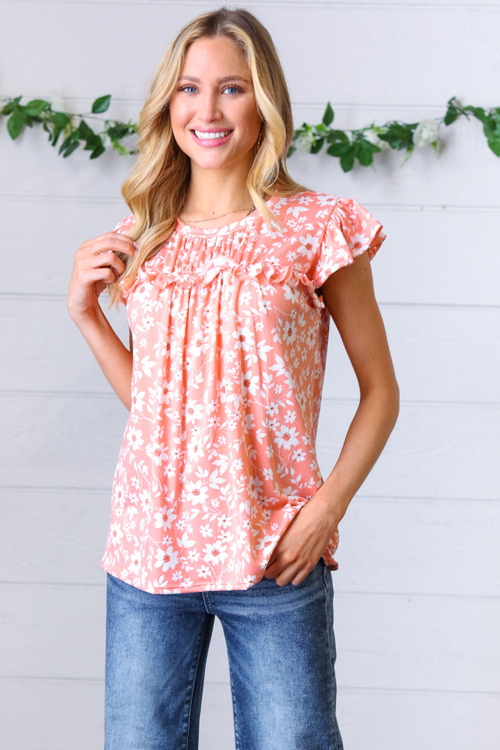 Peach Floral Print Frilled Shorts Sleeve Yoke Tops | Nikki &amp; Co. Boutique