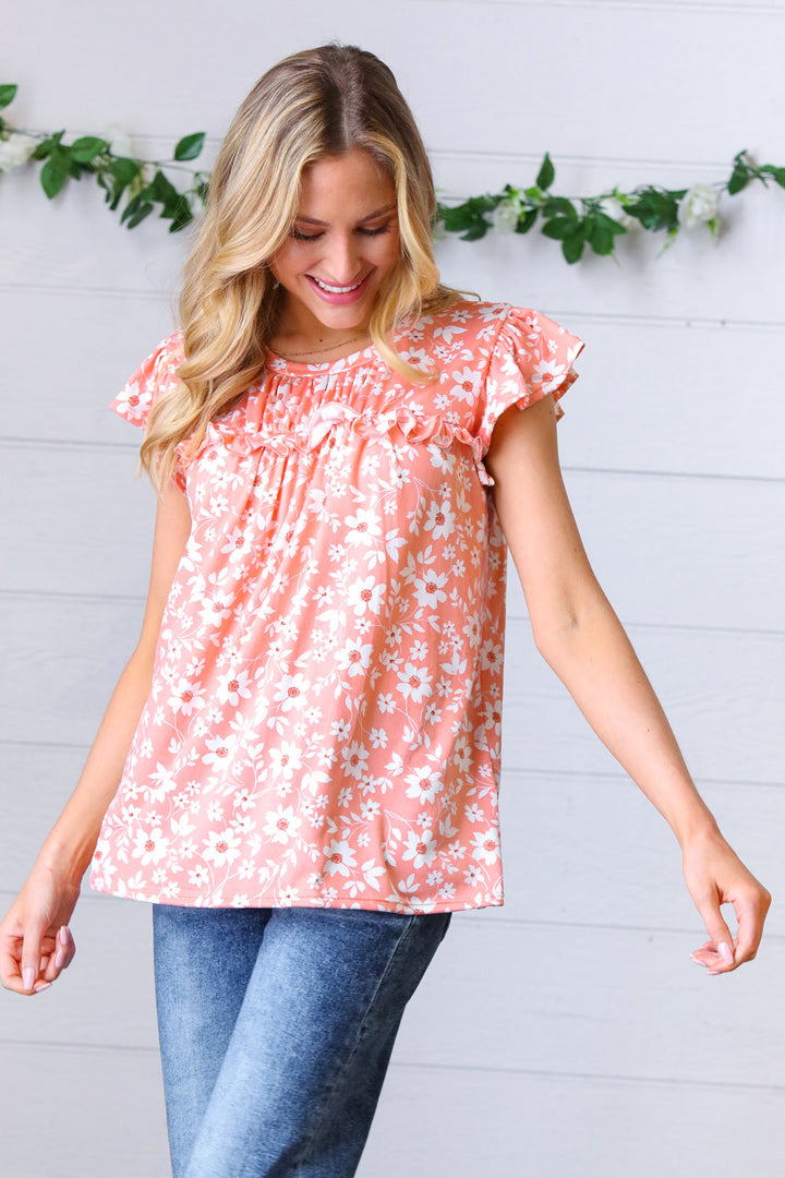 Peach Floral Print Frilled Shorts Sleeve Yoke Tops | Nikki &amp; Co. Boutique