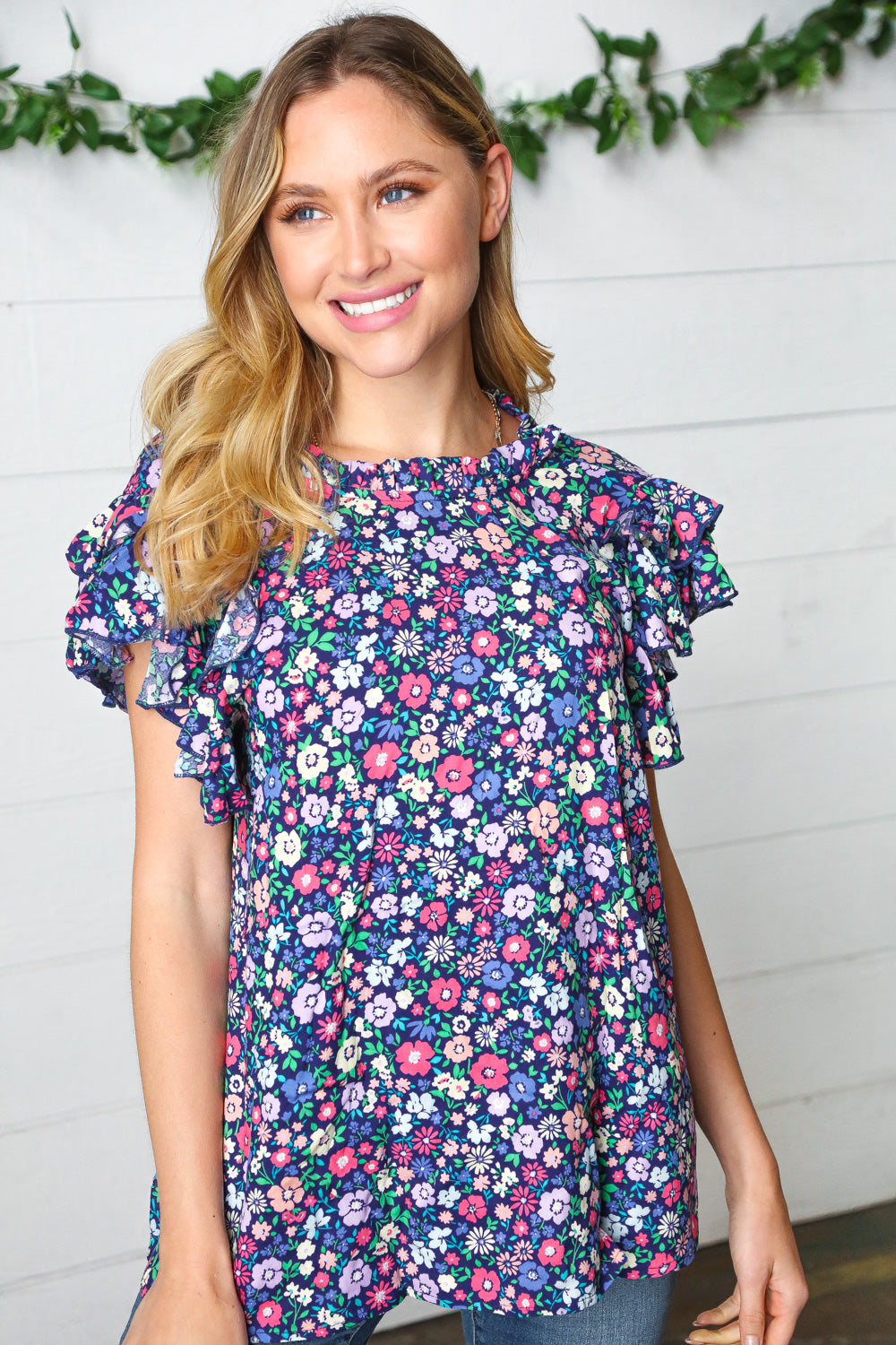 Navy Floral Mock Neck Flutter Sleeve Tops | Nikki &amp; Co. Boutique