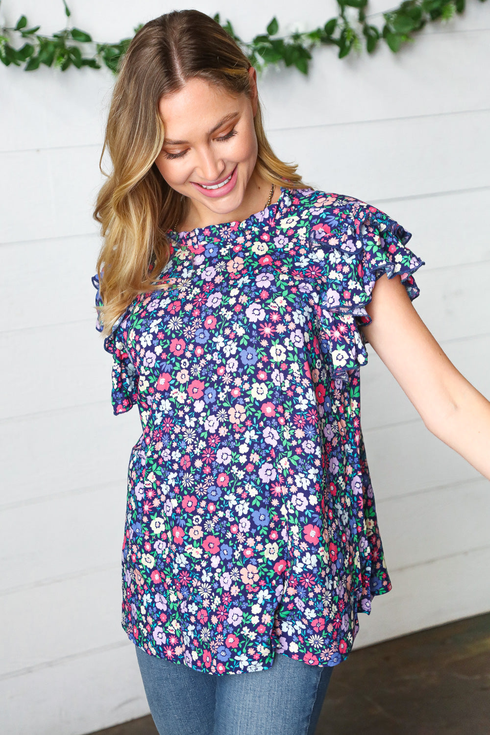Navy Floral Mock Neck Flutter Sleeve Tops | Nikki &amp; Co. Boutique