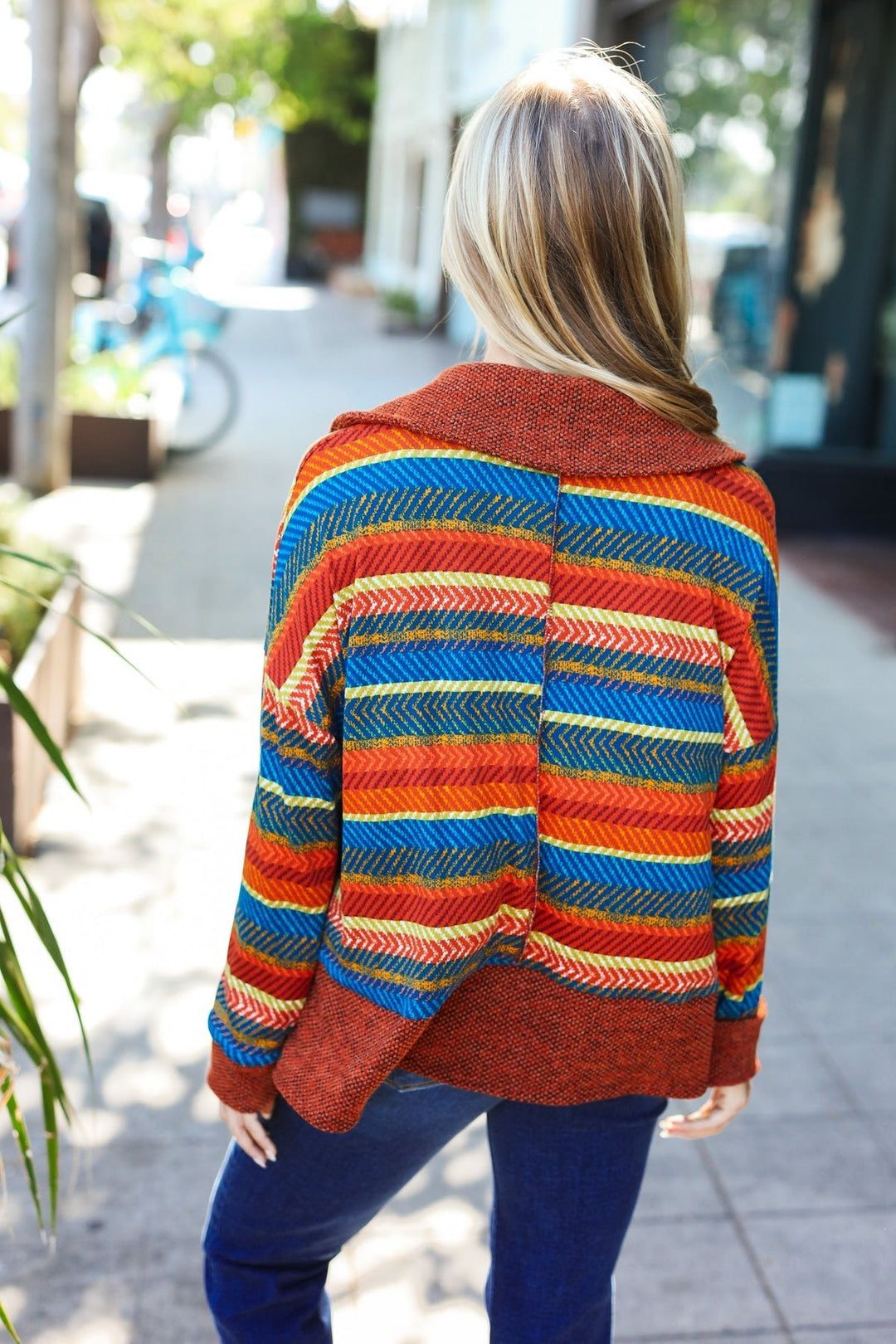 Casual Living Rust &amp; Teal Striped Two Tone Knit Pocketed Top | Nikki &amp; Co. Boutique