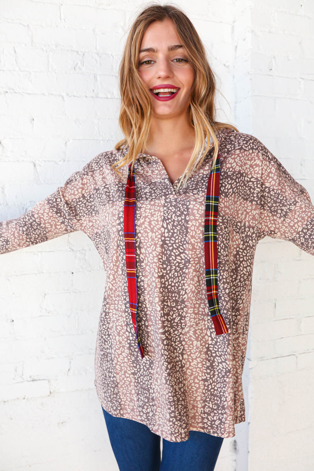 Beige Striped Animal Print Drawstring Hoodie | Nikki &amp; Co. Boutique