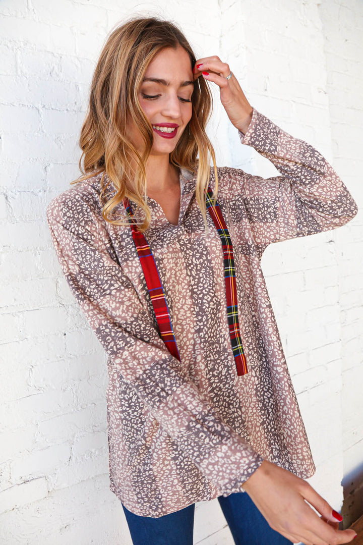 Beige Striped Animal Print Drawstring Hoodie | Nikki &amp; Co. Boutique