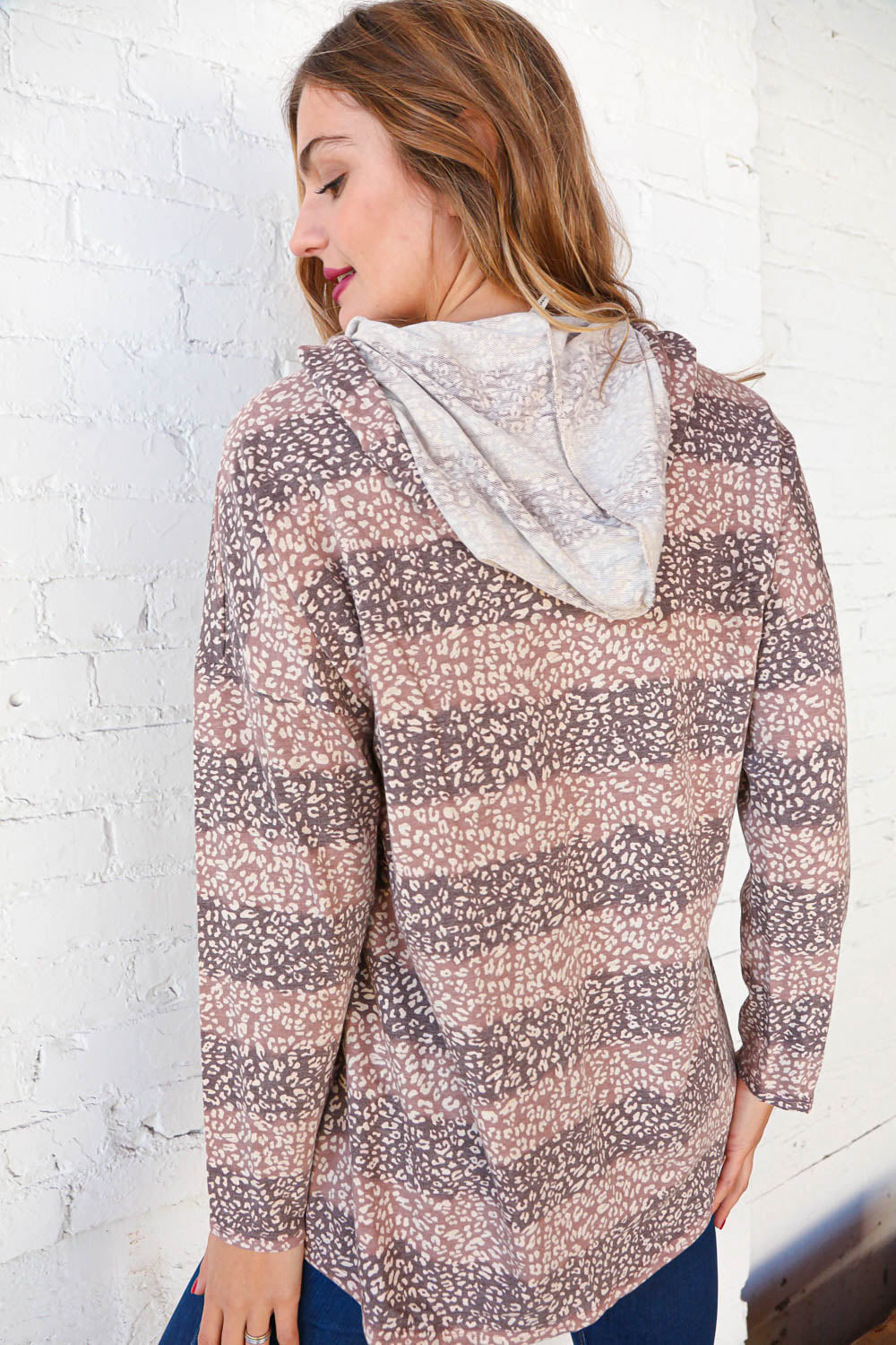 Beige Striped Animal Print Drawstring Hoodie | Nikki &amp; Co. Boutique