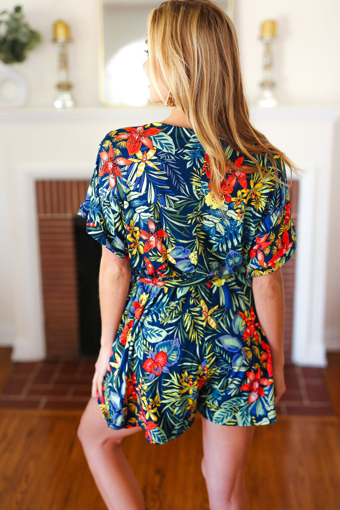 Navy Tropical Floral Surplice Romper | Nikki &amp; Co. Boutique