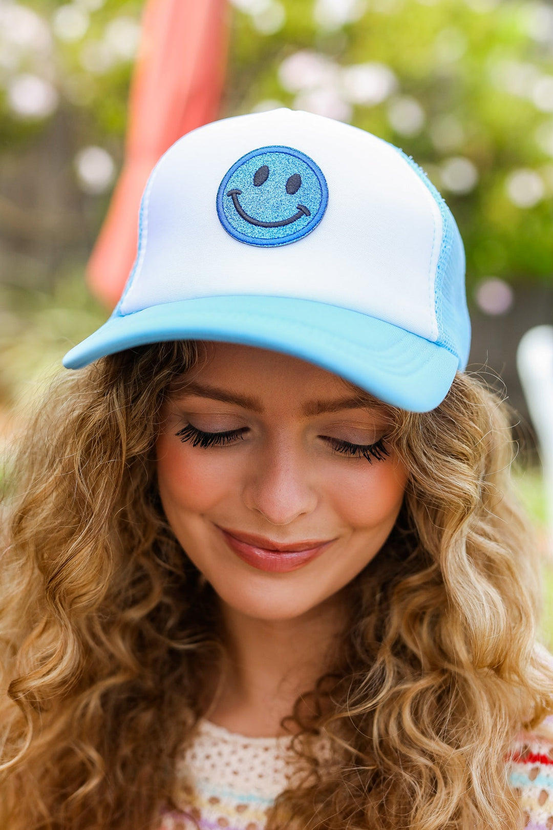 Baby Blue Glitter Smiley Face Mesh Trucker Hat | Nikki &amp; Co. Boutique