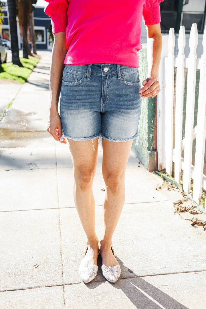 Dark Denim Mid rise raw frayed hem denim Shorts - Nikki &amp; Co. Boutique