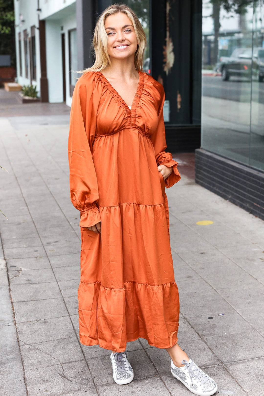Elegant Rust Elastic V Neck Tiered Satin Maxi Dress | Nikki &amp; Co. Boutique