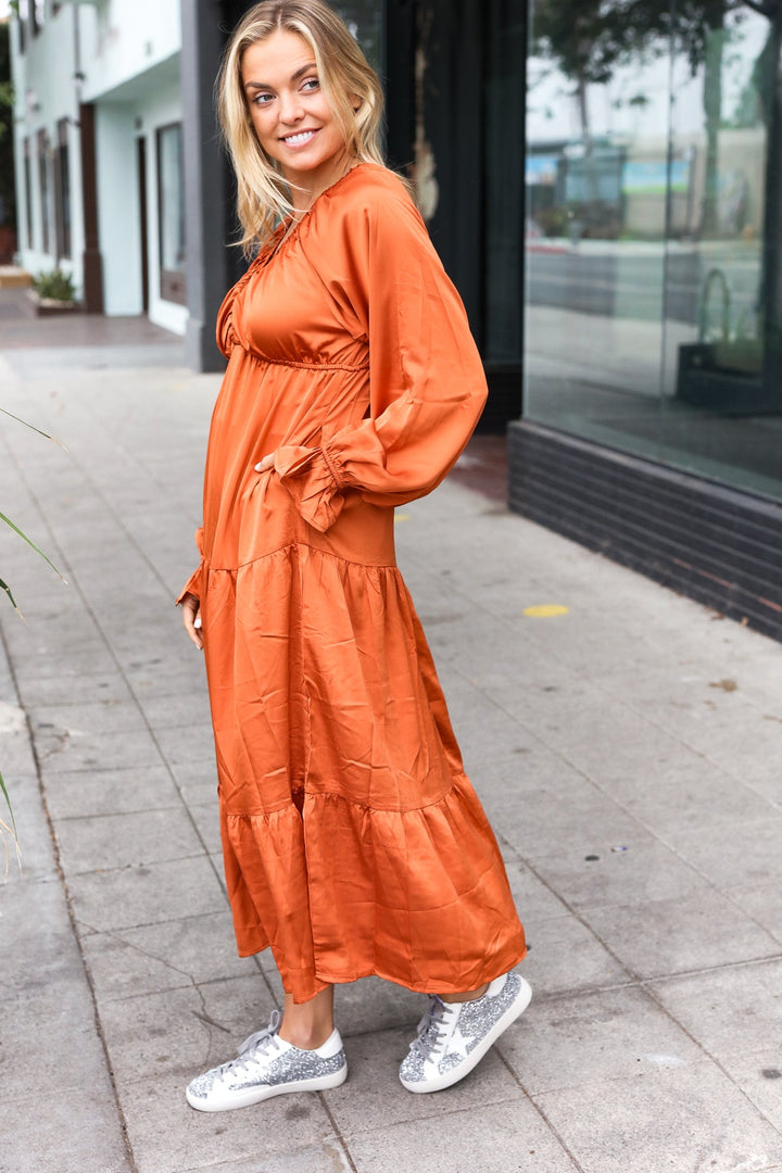 Elegant Rust Elastic V Neck Tiered Satin Maxi Dress | Nikki &amp; Co. Boutique
