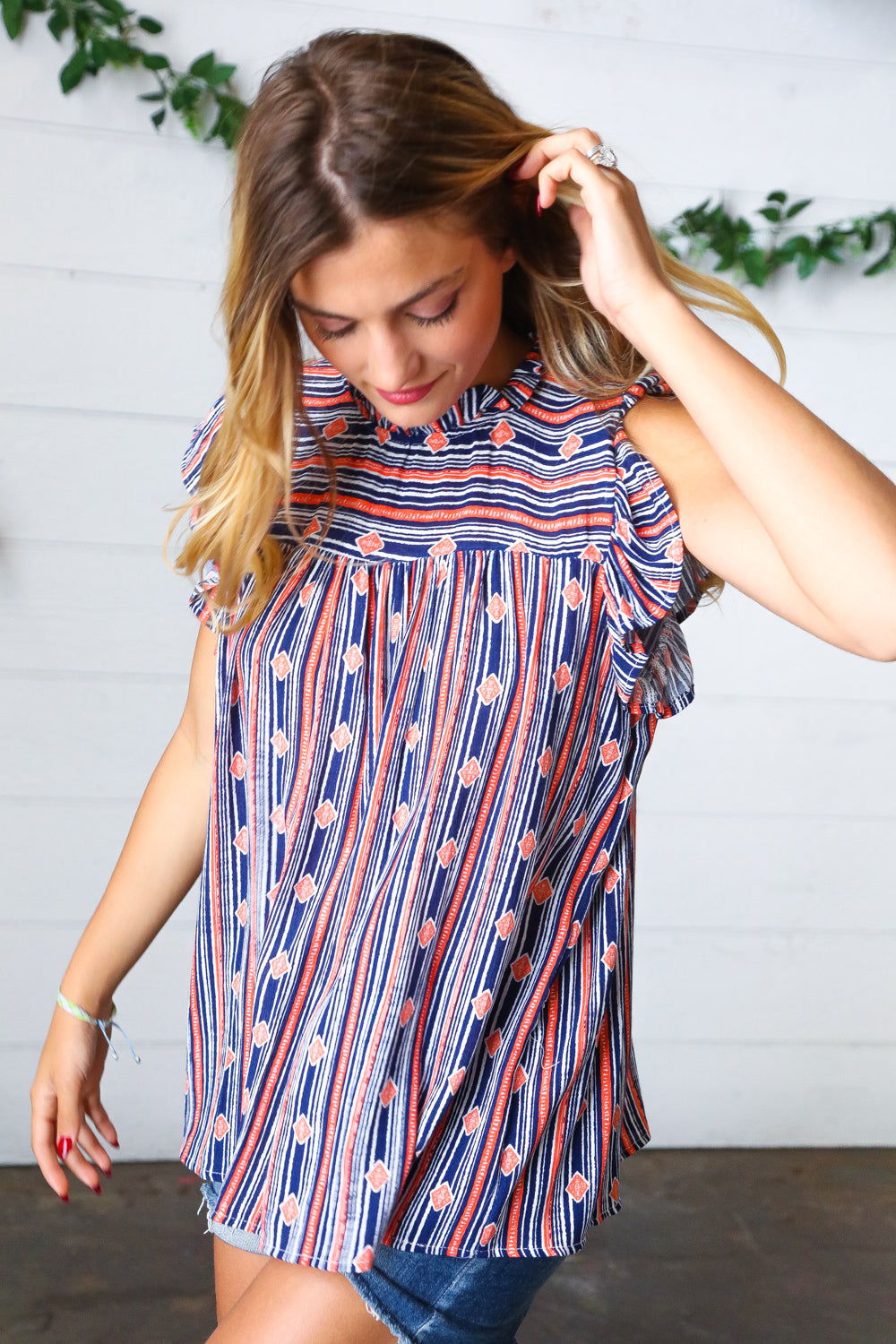 Navy &amp; Orange Boho Stripe Flutter Sleeve Tops | Nikki &amp; Co. Boutique