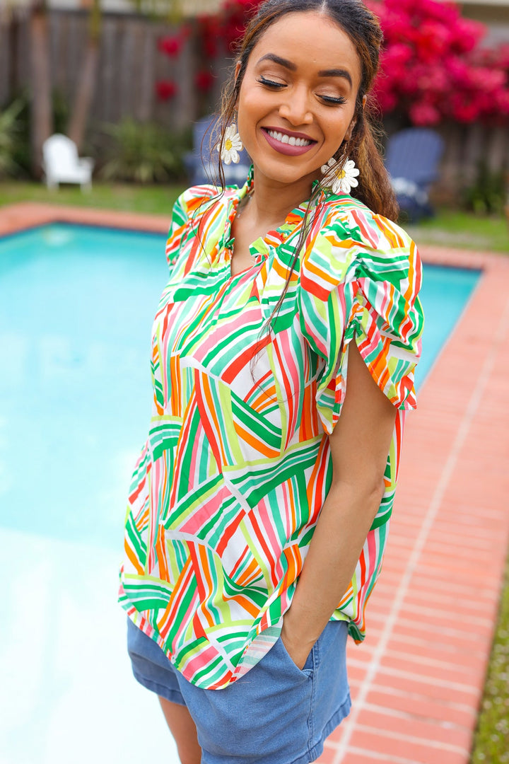 Hello Beautiful Green &amp; Orange Geo Frill Notch Neck Puff Sleeve Tops | Nikki &amp; Co. Boutique