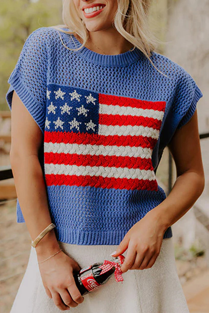 Woman wearing a blue sweater with an American flag design.
