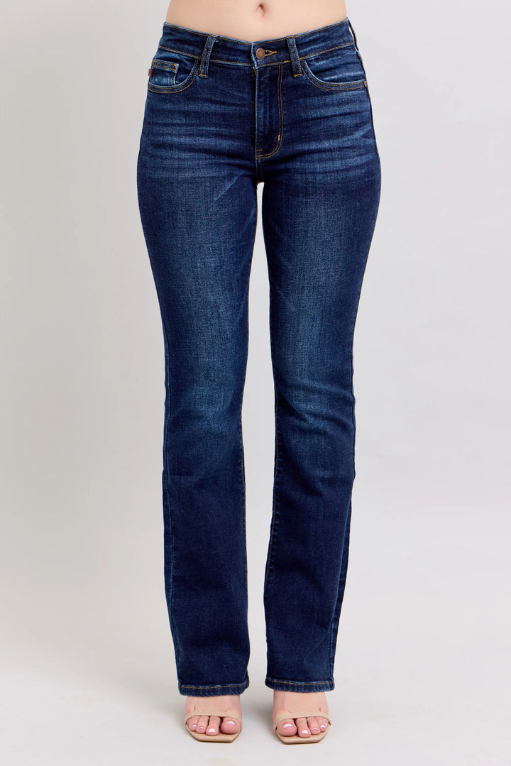 Blue jeans on a plain background