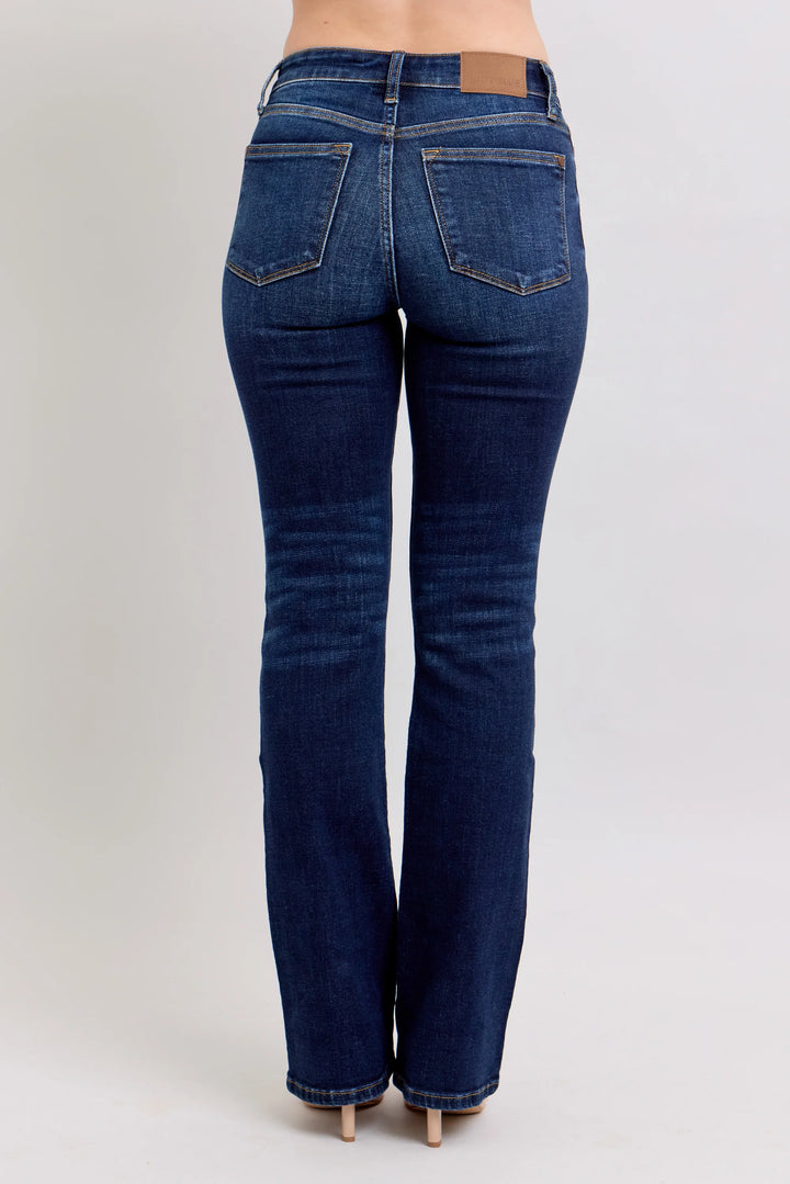 Blue jeans on a plain background