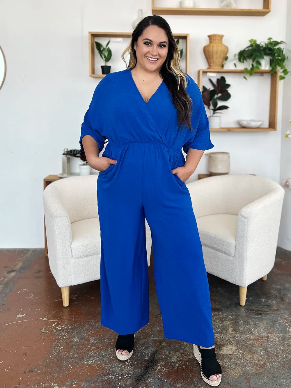 Double Take Full Size Surplice Wide Leg Jumpsuit with Pockets | Nikki &amp; Co. Boutique